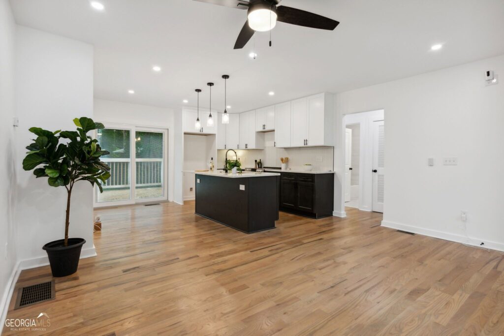 Hardwood flooring installation in an open concept kitchen concept Atlanta area home | Parsons Mission Construction