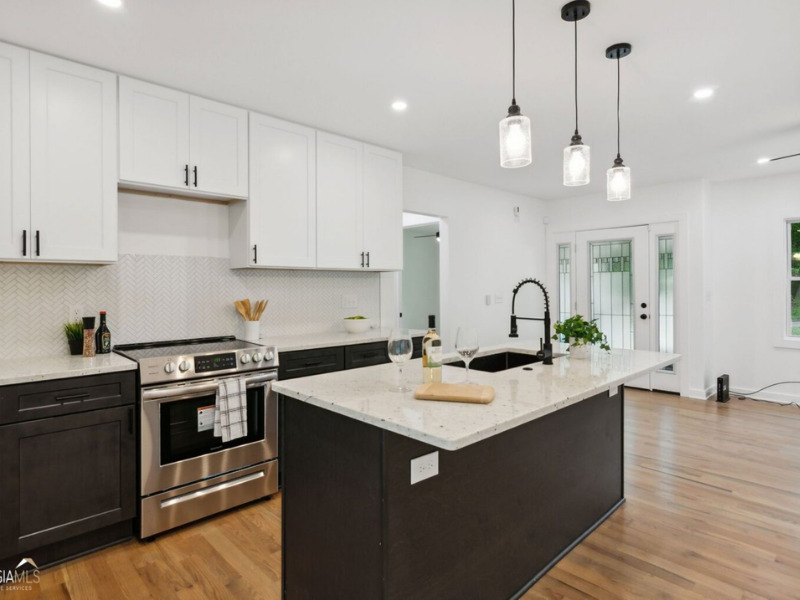 Kitchen renovation after - full kitchen remodel with island and custom cabinetry Atlanta metro | Parsons Mission Construction
